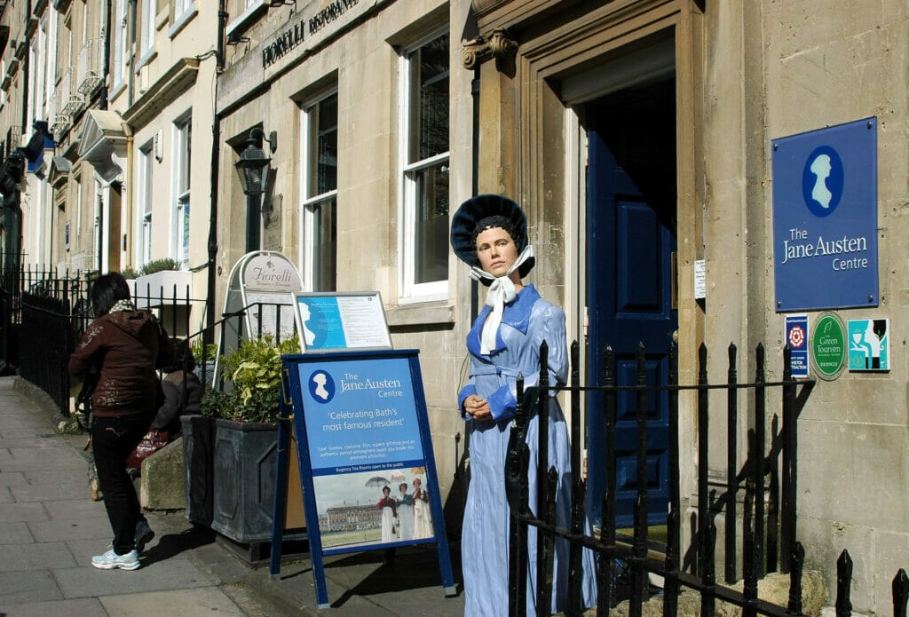 Jane Austen Centre in Bath, with a statue outside dressed like Jane Austen.